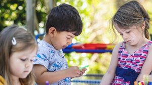 children doing arts and crafts outside