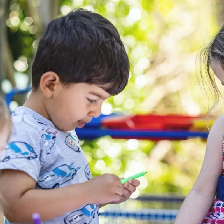 children doing arts and crafts outside