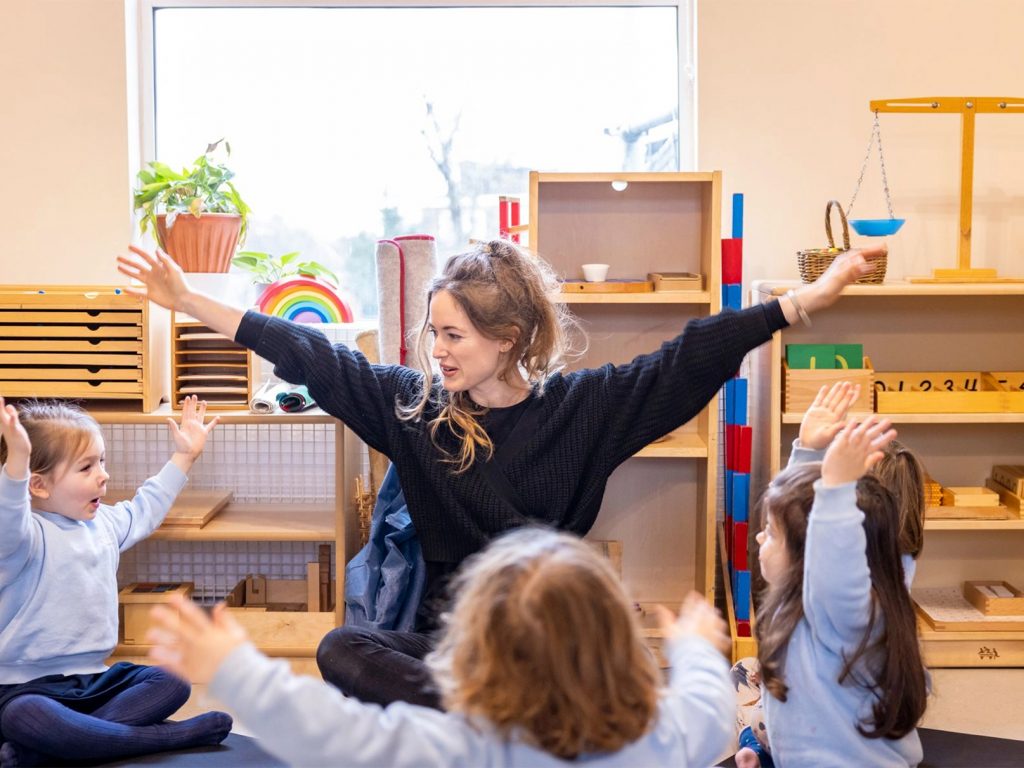 children and teacher stretching