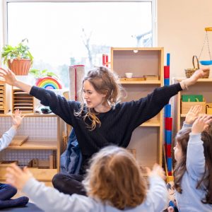 children and teacher stretching