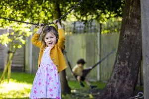 Children playing on a chain walk