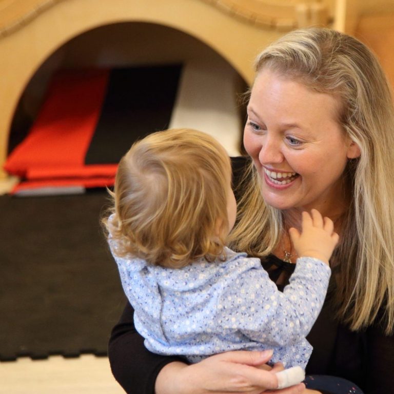 teaching playing with young child